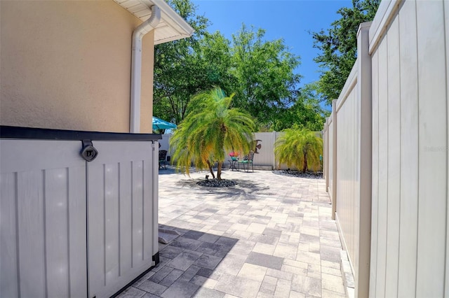 1023 Orca Ct, Holiday, FL 34691 - view of patio featuring a fenced backyard