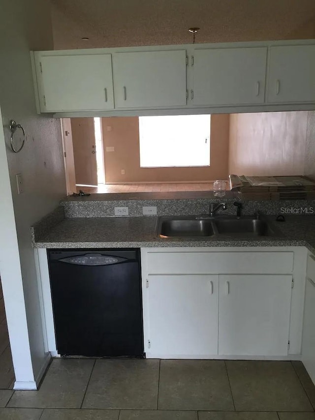 244 Countryside Key Blvd, Oldsmar, FL 34677 - kitchen featuring dishwasher, a sink, and white cabinetry