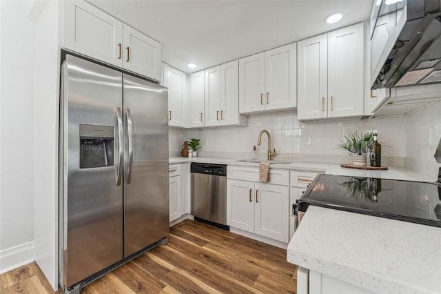 307 S Newport Ave, Tampa, FL 33606 - kitchen featuring a sink, dark wood-style floors, white cabinets, and stainless steel appliances