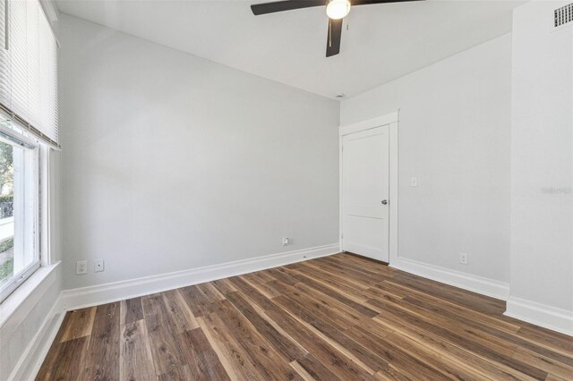 307 S Newport Ave, Tampa, FL 33606 - spare room featuring dark wood-style flooring, visible vents, baseboards, and a ceiling fan