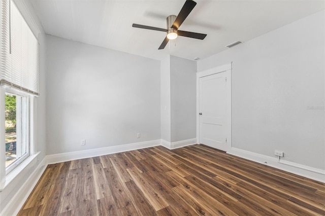 307 S Newport Ave, Tampa, FL 33606 - unfurnished room with visible vents, baseboards, wood finished floors, and ceiling fan