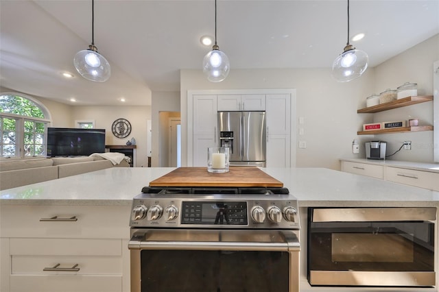 2802 Old Bayshore Way, Tampa, FL 33611 - kitchen with appliances with stainless steel finishes, white cabinets, decorative light fixtures, open shelves, and recessed lighting