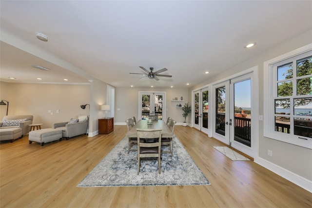 2802 Old Bayshore Way, Tampa, FL 33611 - dining space with light wood-style flooring, a ceiling fan, recessed lighting, baseboards, and french doors