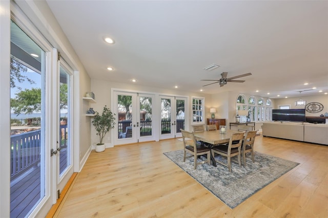 2802 Old Bayshore Way, Tampa, FL 33611 - dining room featuring french doors, recessed lighting, light wood-style flooring, a ceiling fan, and baseboards