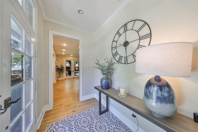 2802 Old Bayshore Way, Tampa, FL 33611 - corridor with ornamental molding, light wood finished floors, and baseboards