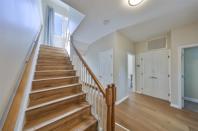 2802 Old Bayshore Way, Tampa, FL 33611 - stairway featuring wood finished floors and baseboards
