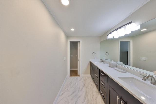 2802 Old Bayshore Way, Tampa, FL 33611 - bathroom with double vanity, marble look tile flooring, baseboards, and recessed lighting