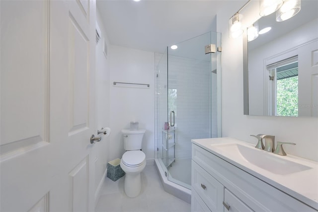 2802 Old Bayshore Way, Tampa, FL 33611 - bathroom featuring toilet, vanity, a stall shower, tile patterned floors, and recessed lighting