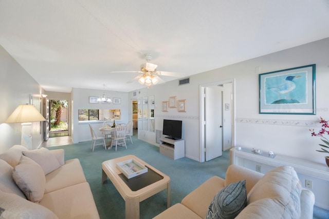 6357 Bahia Del Mar Blvd Unit 111, Saint Petersburg, FL 33715 - carpeted living area featuring ceiling fan with notable chandelier and visible vents