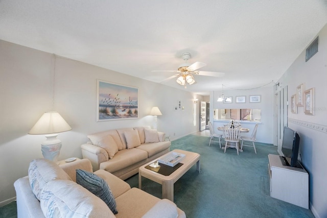 6357 Bahia Del Mar Blvd Unit 111, Saint Petersburg, FL 33715 - carpeted living area featuring visible vents and a ceiling fan