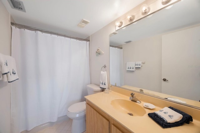 6357 Bahia Del Mar Blvd Unit 111, Saint Petersburg, FL 33715 - bathroom featuring visible vents, tile patterned flooring, toilet, and vanity