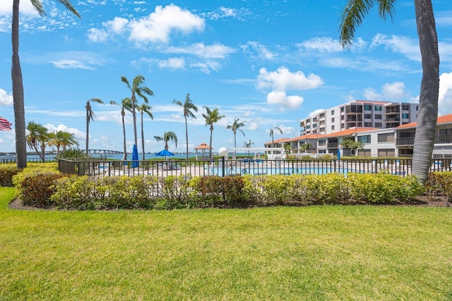 6357 Bahia Del Mar Blvd Unit 111, Saint Petersburg, FL 33715 - view of home's community featuring a lawn and fence