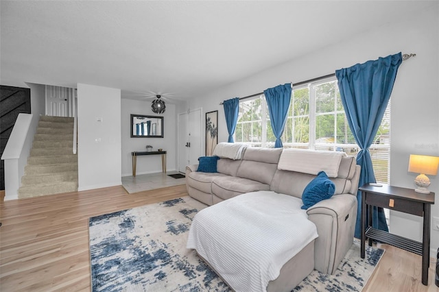 613 Valley Hill Dr, Brandon, FL 33510 - living area with stairs, wood finished floors, and baseboards