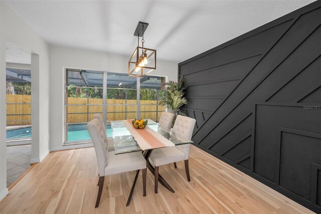 613 Valley Hill Dr, Brandon, FL 33510 - dining room with light wood-type flooring and baseboards