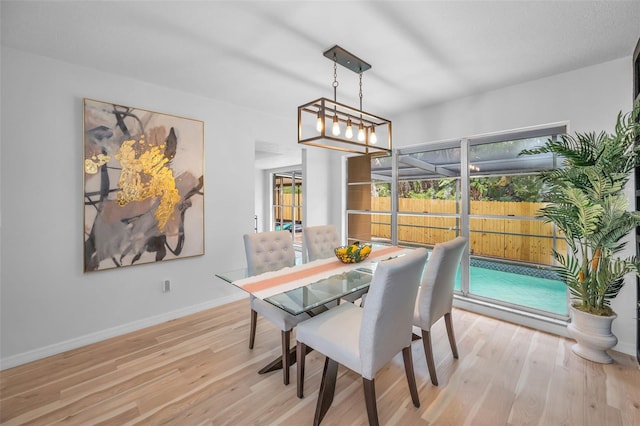 613 Valley Hill Dr, Brandon, FL 33510 - dining space with light wood-type flooring and baseboards