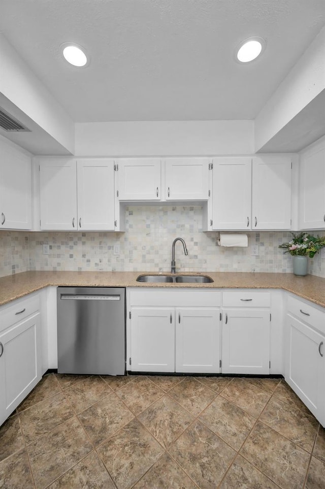 613 Valley Hill Dr, Brandon, FL 33510 - kitchen with stainless steel dishwasher, a sink, and white cabinets