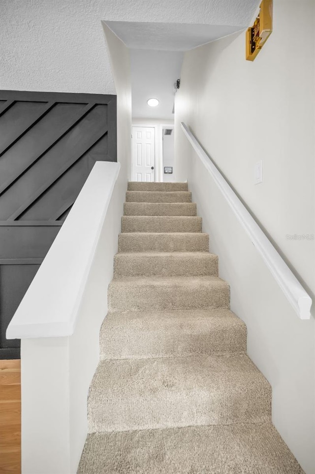613 Valley Hill Dr, Brandon, FL 33510 - stairs with wood finished floors