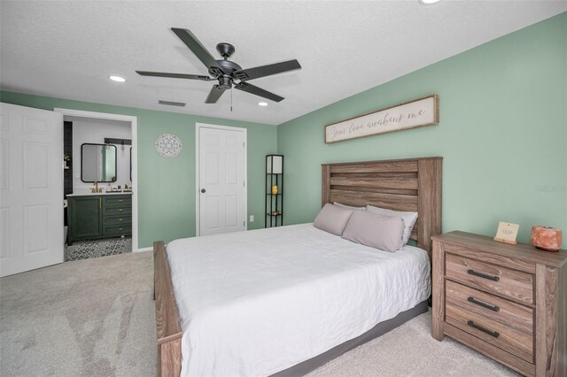 613 Valley Hill Dr, Brandon, FL 33510 - bedroom with carpet flooring, recessed lighting, connected bathroom, and ceiling fan