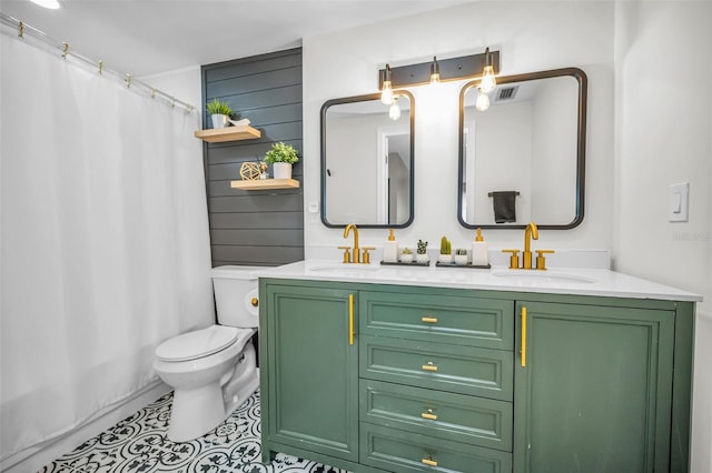 613 Valley Hill Dr, Brandon, FL 33510 - full bath featuring toilet, double vanity, tile patterned floors, and a shower with curtain