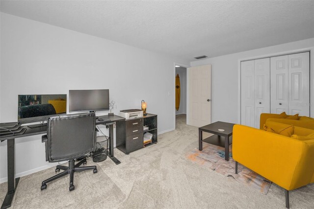 613 Valley Hill Dr, Brandon, FL 33510 - carpeted home office with a textured ceiling and baseboards