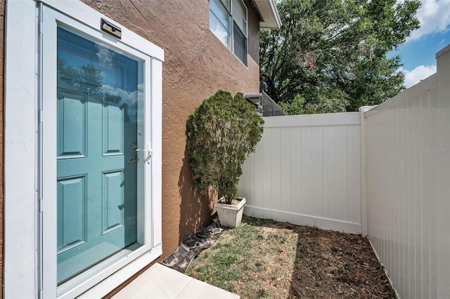 613 Valley Hill Dr, Brandon, FL 33510 - view of exterior entry featuring stucco siding