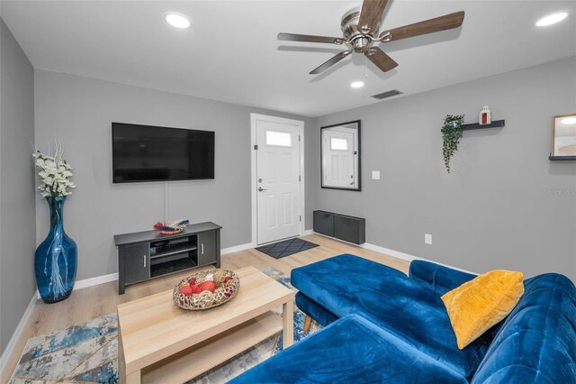 613 Valley Hill Dr, Brandon, FL 33510 - living room with light wood finished floors, ceiling fan, baseboards, and recessed lighting