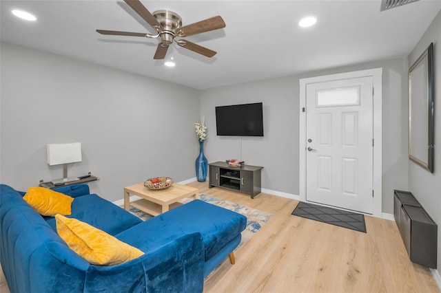 613 Valley Hill Dr, Brandon, FL 33510 - living area with wood finished floors, ceiling fan, recessed lighting, and baseboards
