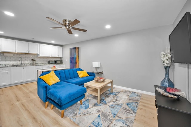 613 Valley Hill Dr, Brandon, FL 33510 - living area featuring a ceiling fan, light wood-style floors, recessed lighting, and baseboards