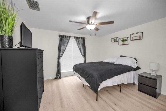 613 Valley Hill Dr, Brandon, FL 33510 - bedroom featuring light wood finished floors, baseboards, and ceiling fan