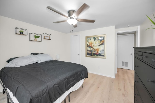 613 Valley Hill Dr, Brandon, FL 33510 - bedroom featuring light wood-style floors, baseboards, and a ceiling fan