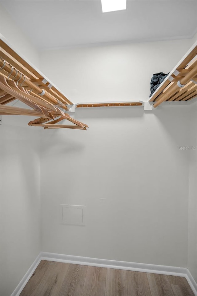613 Valley Hill Dr, Brandon, FL 33510 - spacious closet featuring wood finished floors
