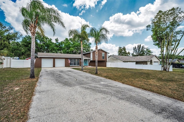 613 Valley Hill Dr, Brandon, FL 33510 - view of front of home featuring an attached garage and concrete driveway