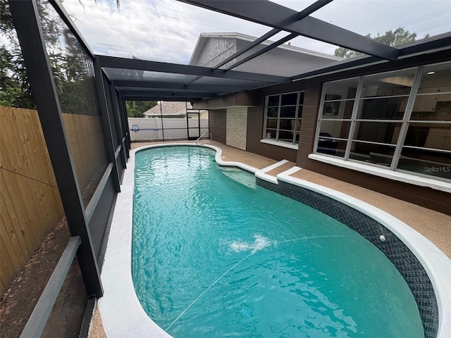 613 Valley Hill Dr, Brandon, FL 33510 - view of swimming pool featuring a fenced backyard, glass enclosure, and a patio