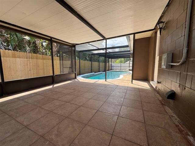 613 Valley Hill Dr, Brandon, FL 33510 - unfurnished sunroom featuring a pool