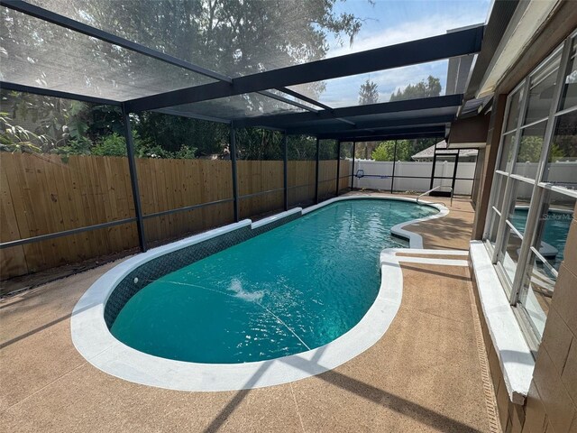 613 Valley Hill Dr, Brandon, FL 33510 - view of pool featuring a fenced backyard, glass enclosure, and a patio