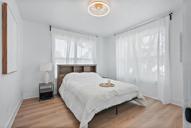 3000 19th Ave S, Saint Petersburg, FL 33712 - bedroom with light wood-style floors and baseboards
