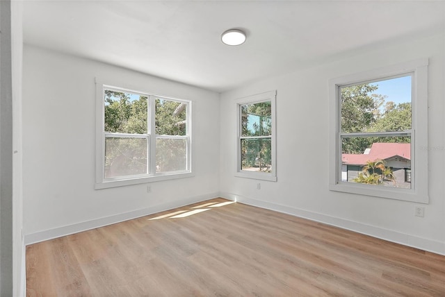 3000 19th Ave S, Saint Petersburg, FL 33712 - spare room with light wood finished floors and baseboards