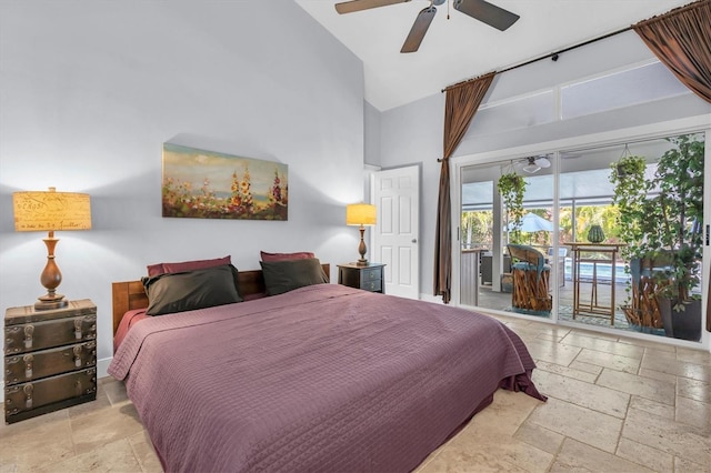 bedroom with high vaulted ceiling, ceiling fan, stone tile floors, and access to exterior