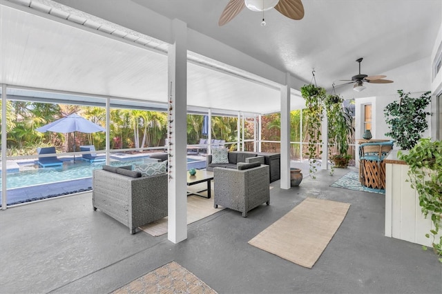 view of patio / terrace featuring an outdoor pool, an outdoor living space, and a ceiling fan