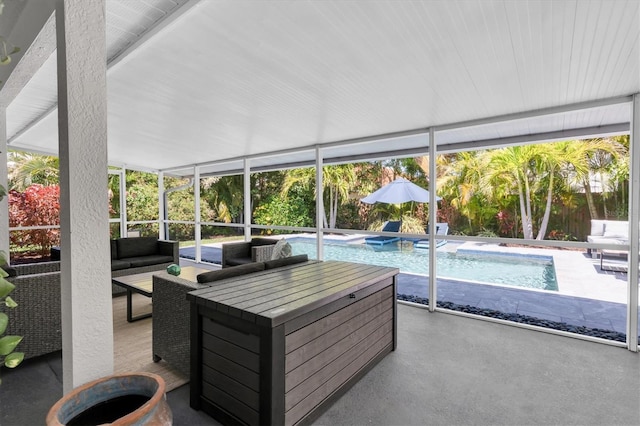 sunroom / solarium featuring an outdoor living space