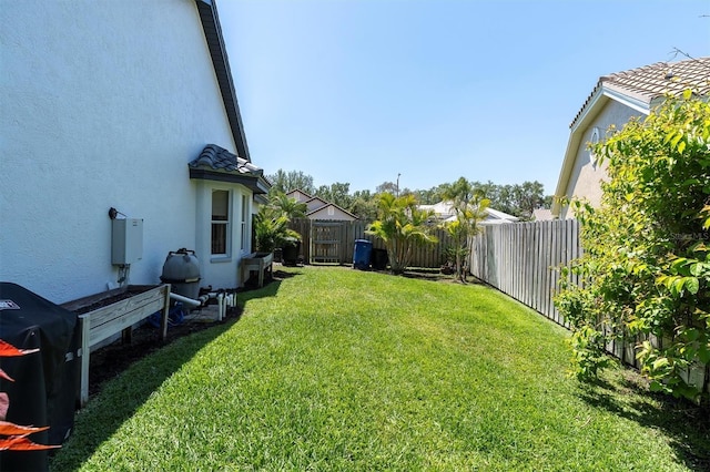 view of yard featuring a fenced backyard