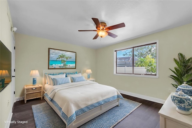 11797 David Ct, Largo, FL 33778 - bedroom with dark wood finished floors and a ceiling fan