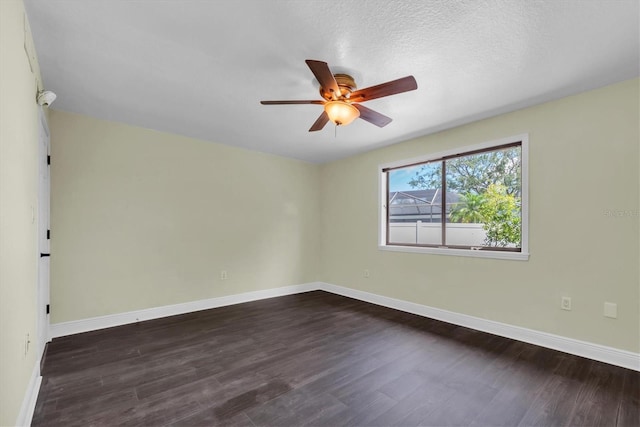 11797 David Ct, Largo, FL 33778 - empty room with dark wood-style floors and ceiling fan