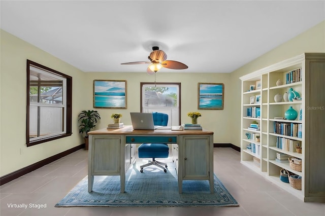 11797 David Ct, Largo, FL 33778 - office area with ceiling fan and light tile patterned flooring