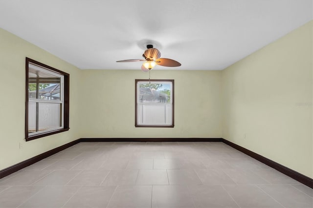 11797 David Ct, Largo, FL 33778 - spare room with a ceiling fan and baseboards