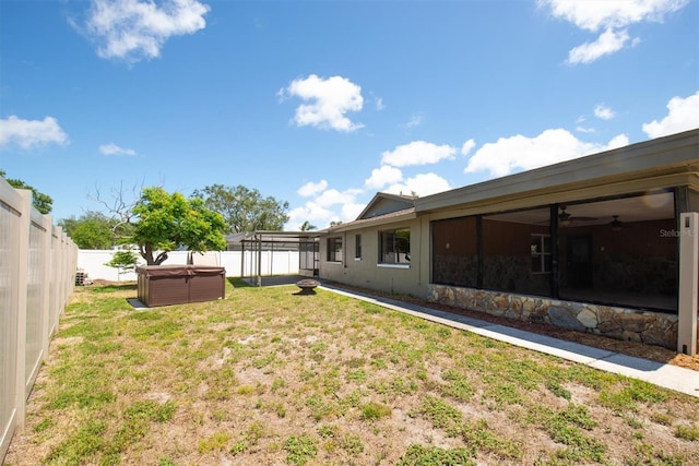 11797 David Ct, Largo, FL 33778 - fenced backyard featuring a hot tub