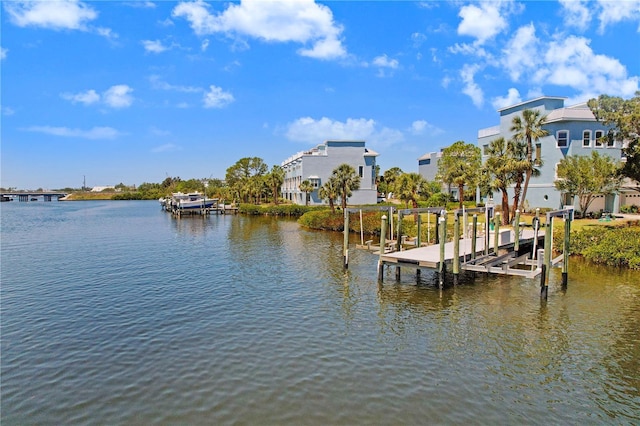 view of dock featuring a water view and boat lift