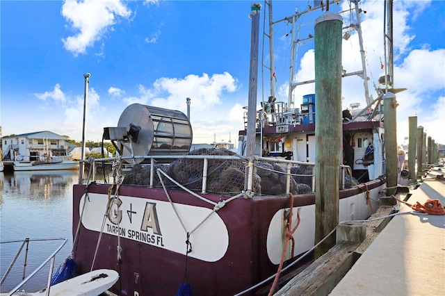 view of dock featuring a water view and boat lift