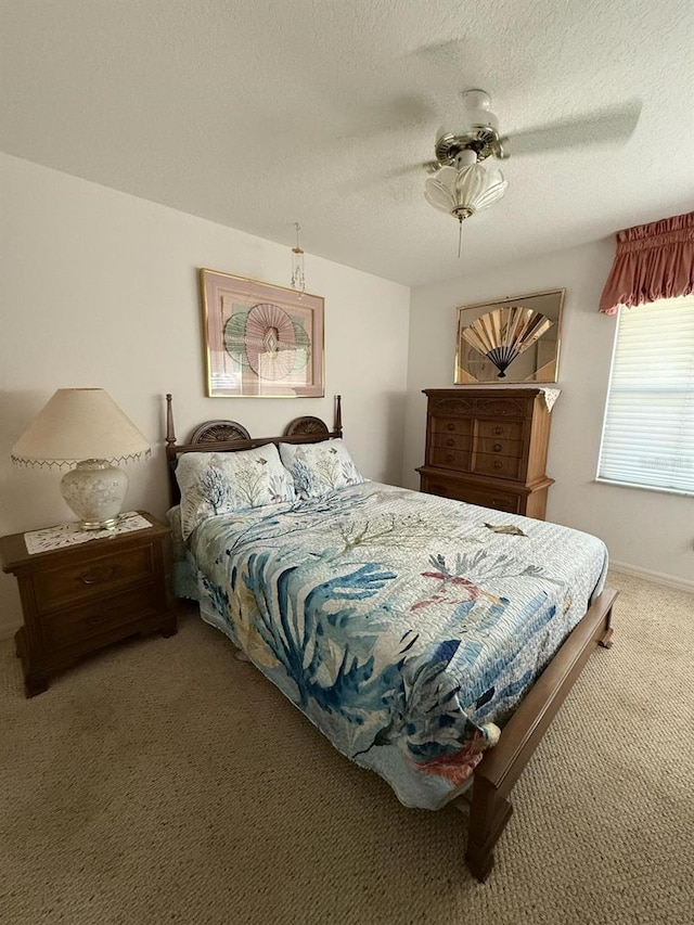 1695 Stable Trl, Palm Harbor, FL 34685 - bedroom with ceiling fan, carpet flooring, and a textured ceiling