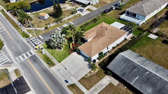 drone / aerial view featuring a water view